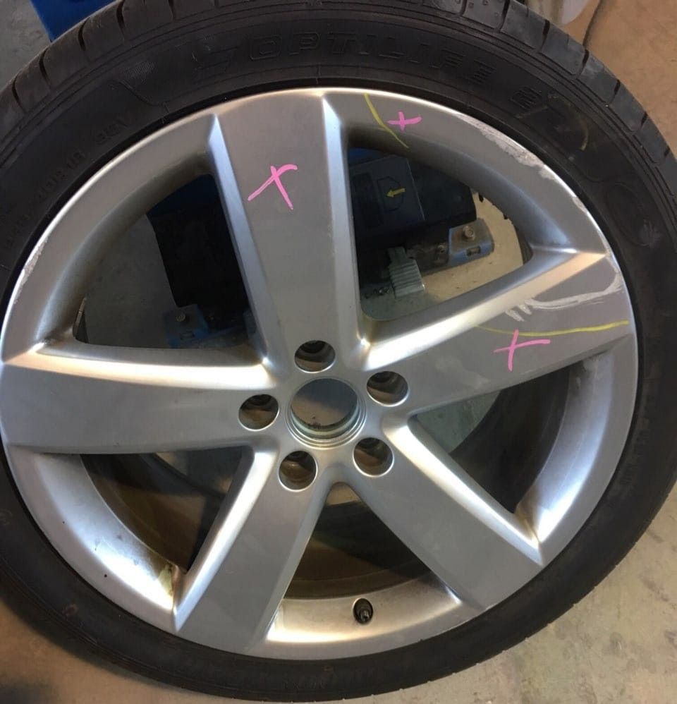 wheel with curb damage marked for rim repair perth rim restoration perth diamond cutting perth curb rash repair perth