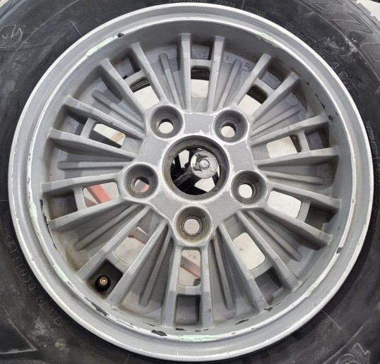 alloy wheel with curb damage — rim repair perth rim restoration perth diamond cutting perth curb rash repair perth